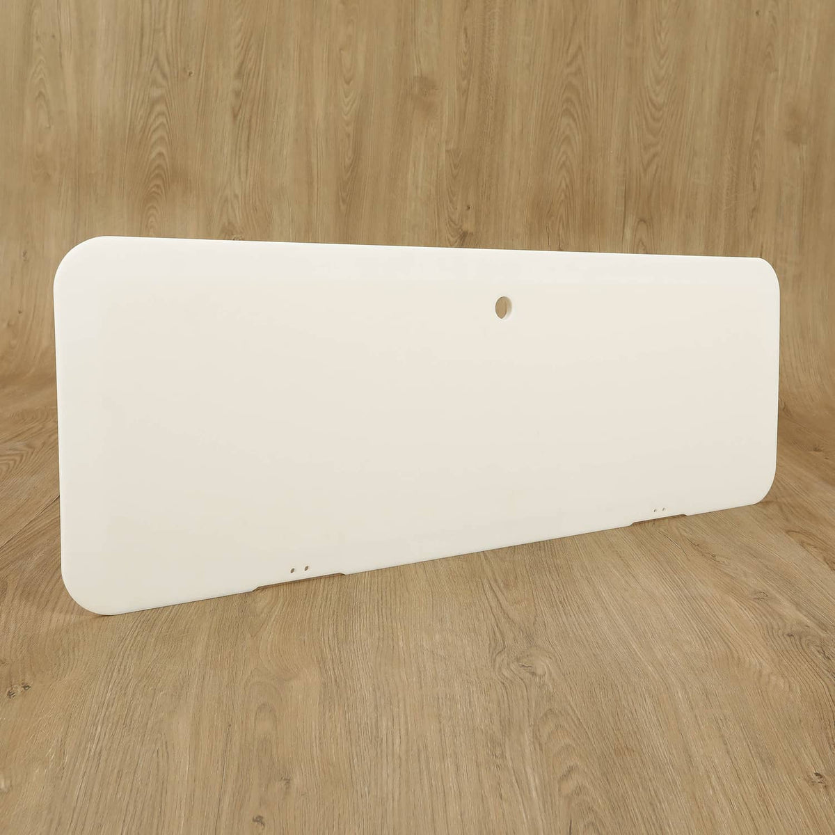 Boat locker door cover lid, white panel with two side screw holes and a central hole