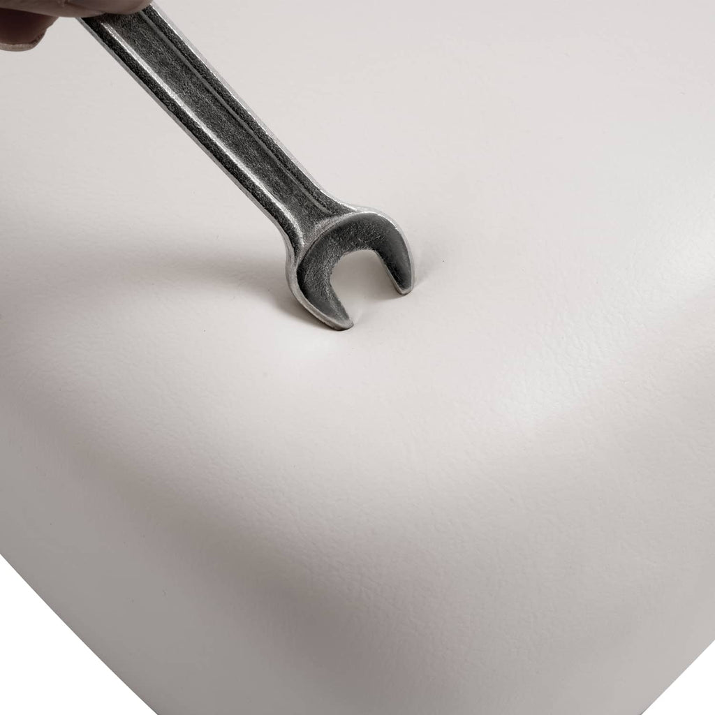 White seat cushion cover with black metal insert and molded edge