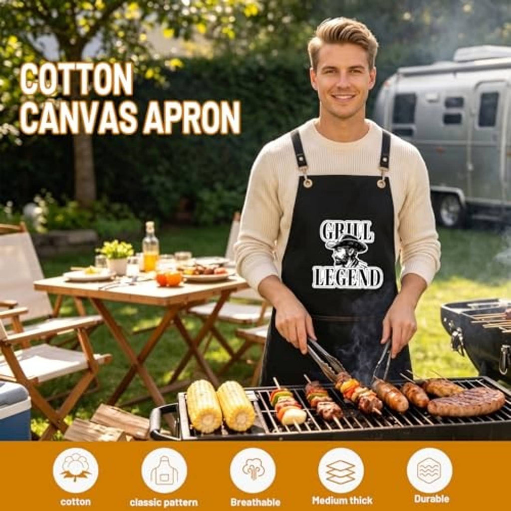 Black cotton canvas apron with Grill Legend print and adjustable cross-back straps.