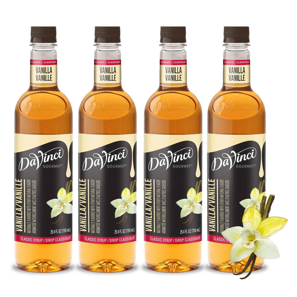 Vanilla syrup bottles (pack of four), amber liquid with vanilla labels and black caps