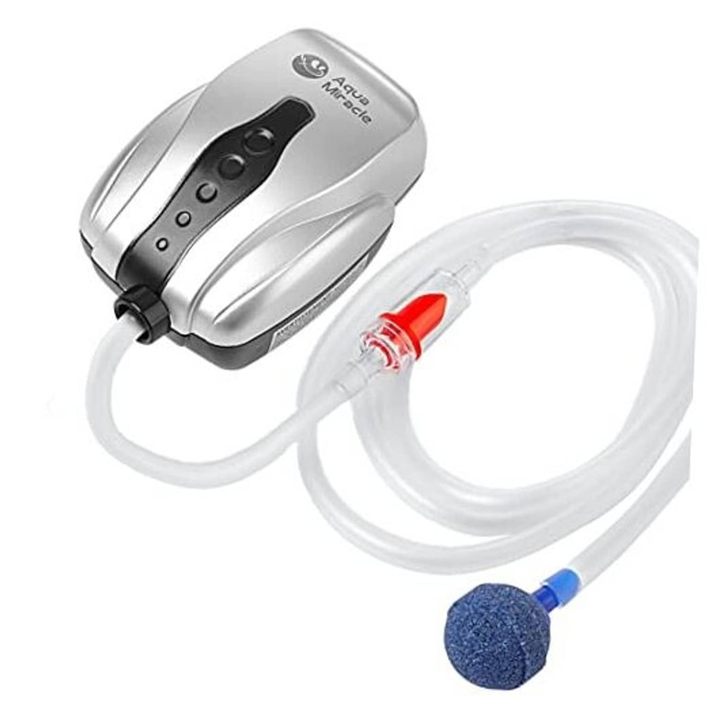 Aquarium air pump with airline tubing, red check valve, and blue air stone