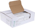 Clear plastic trash can liners in open cardboard box, rolled bags inside