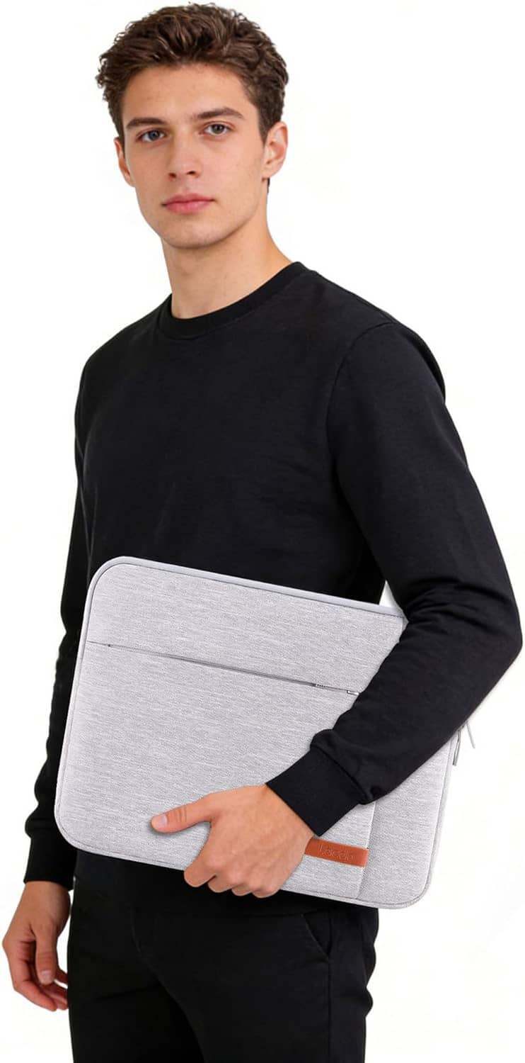 Light gray 13-inch laptop sleeve case held by a person at chest height