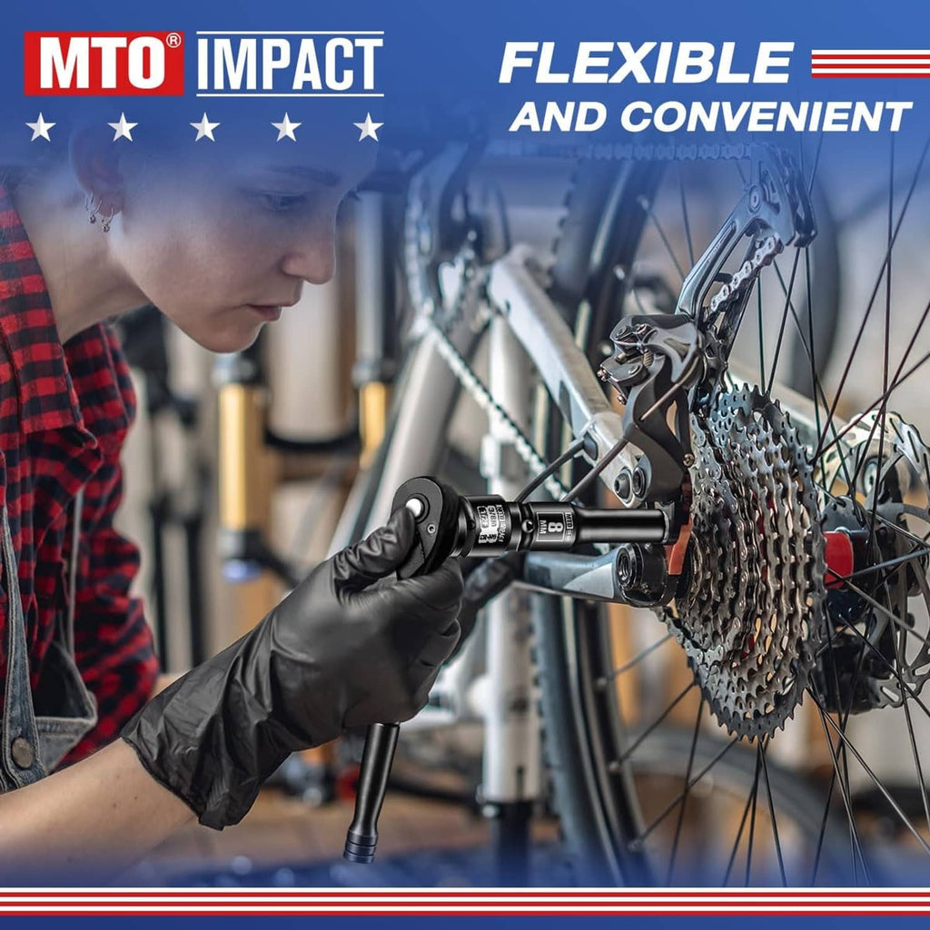 Black impact socket adapter held on a bicycle rear axle area