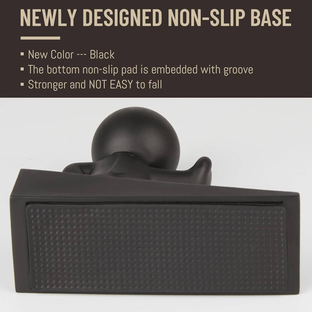Close-up of black non-slip door stop base with embedded grippy pad texture.