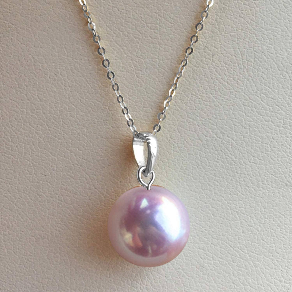 Silver-tone eye hook bail holding a round pearl pendant on a chain