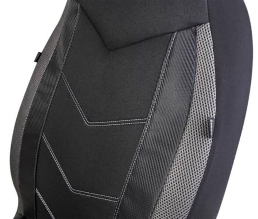 Close-up of high-back seat cover with stitched chevrons and gray mesh side panel