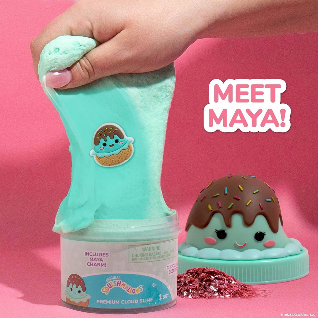 Teal cloud slime jar with smiling ice-cream character charm, squeezed slime in hand
