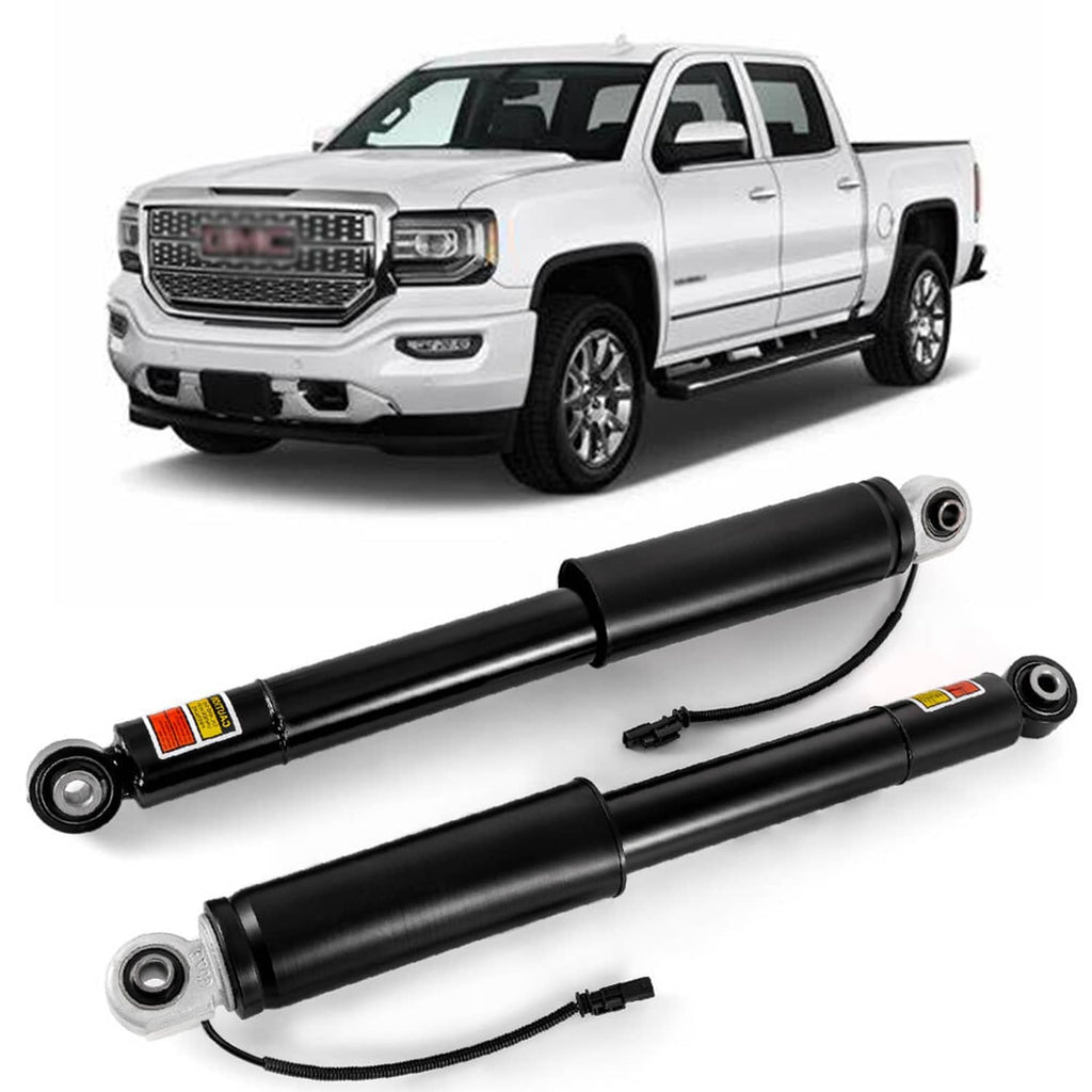 Black rear shock strut pair with eyelet mounts and attached cable