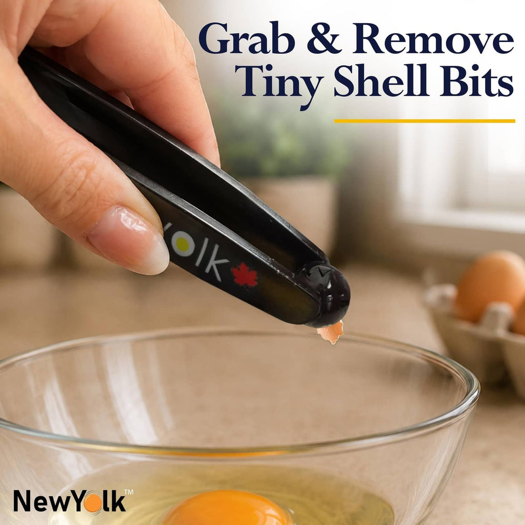 Black egg chalaza remover tool pinching tiny shell bits above a glass bowl