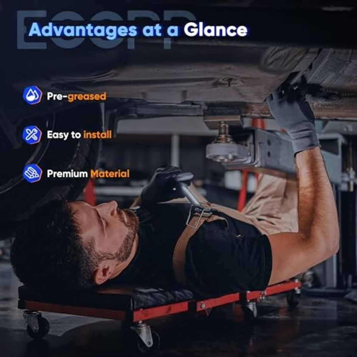 Mechanic installing a front suspension with a ball joint kit under the vehicle