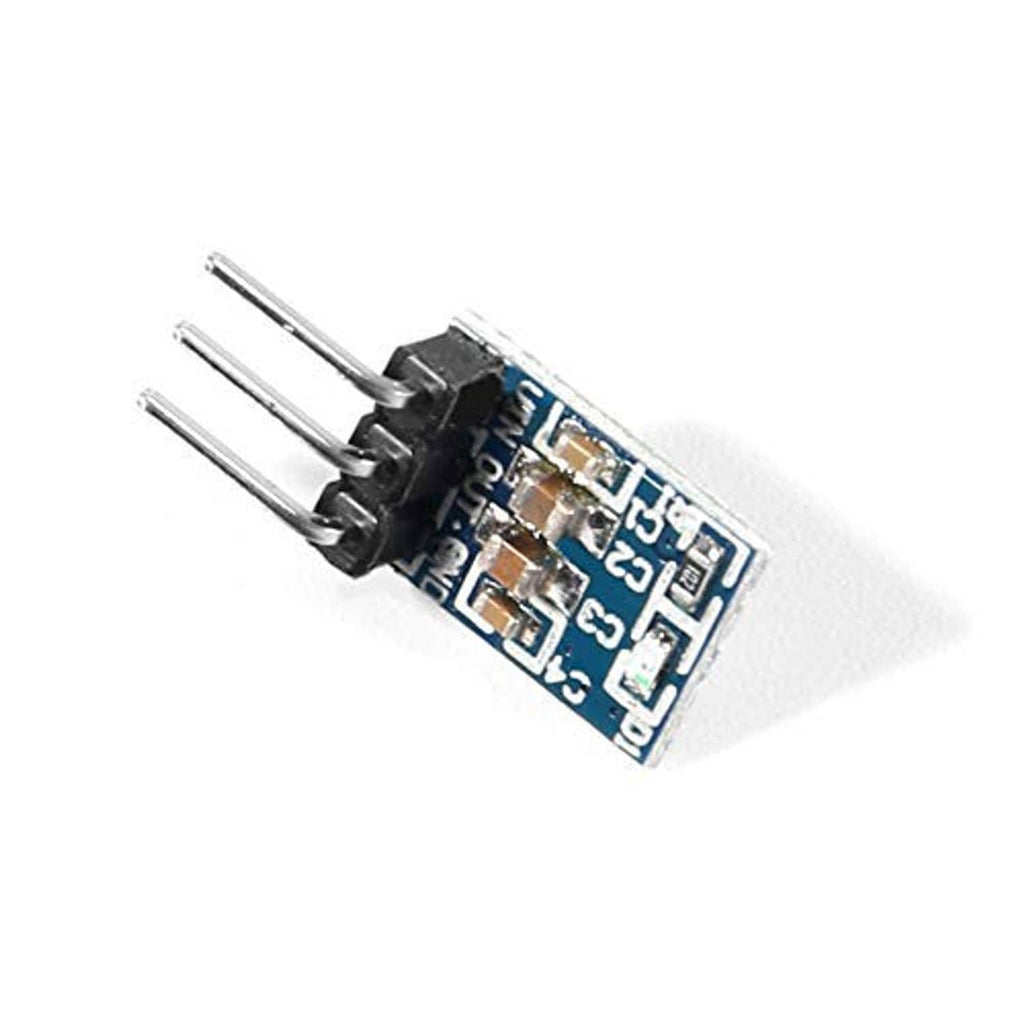 Angled view of 3.3V DC-DC buck converter module with 3-pin header on blue PCB