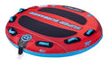 Red and blue towable boating tube for two with black handles and oval openings