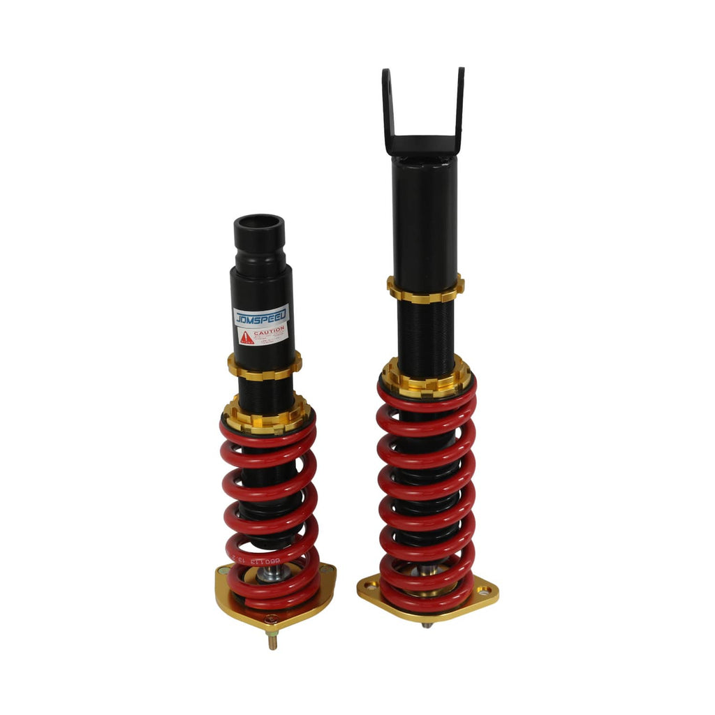 Front-facing pair of coilovers with red springs, black shocks, and gold base plates