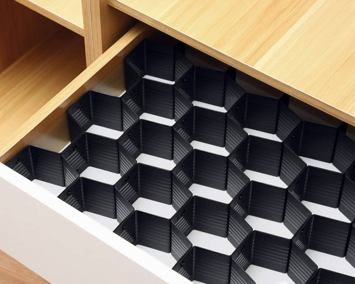 Black honeycomb cubby divider insert for drawer with grid of interlocking cells