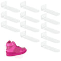 Clear floating shoe display shelf set with multiple arms, holding a sneaker