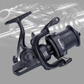 Black spinning fishing reel with worm-shaft style handle and spool, front view