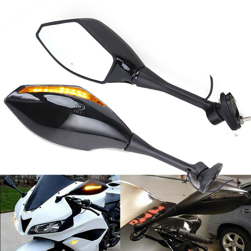 Set of black LED turn signal side mirrors with amber strip lights turned on