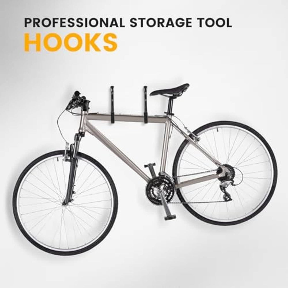 Garage storage J hooks holding a bicycle by the frame
