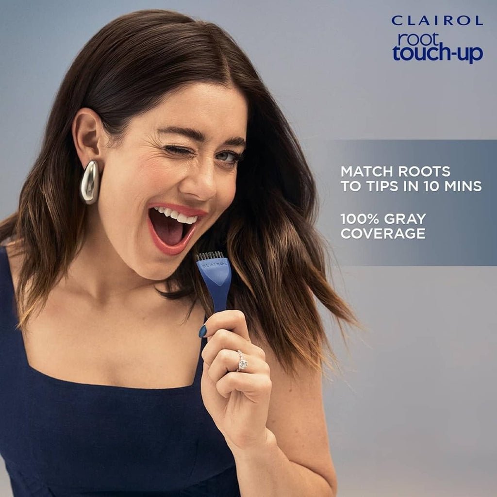 Clairol root touch-up applicator brush used on brunette hair at the roots