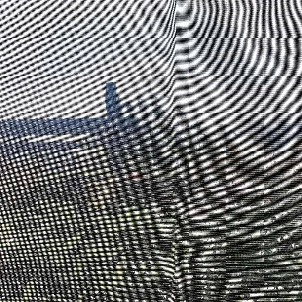 Close-up of black woven mesh fabric for RV awning side shade screen