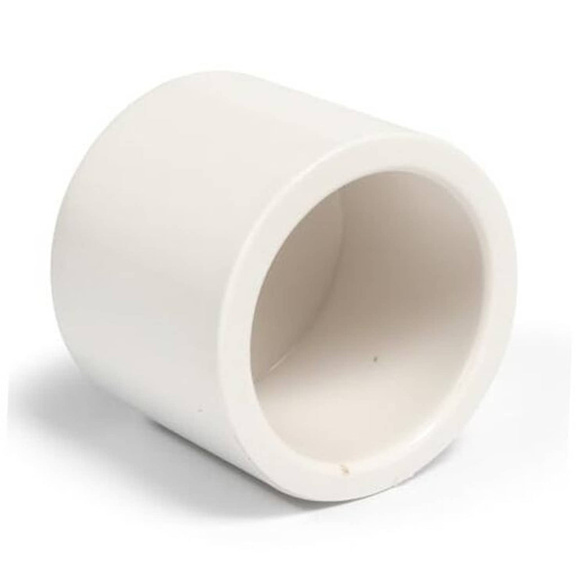 White PVC socket cap pipe end fitting with open round interior