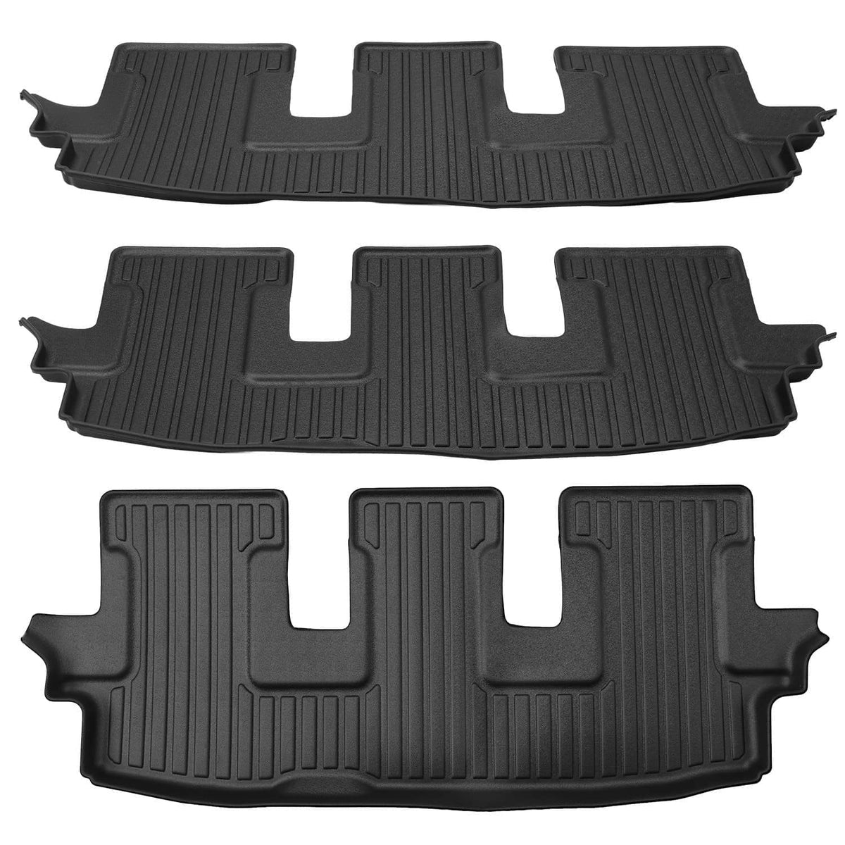 Black TPE floor mat set with molded grooves for front, rear, and cargo areas