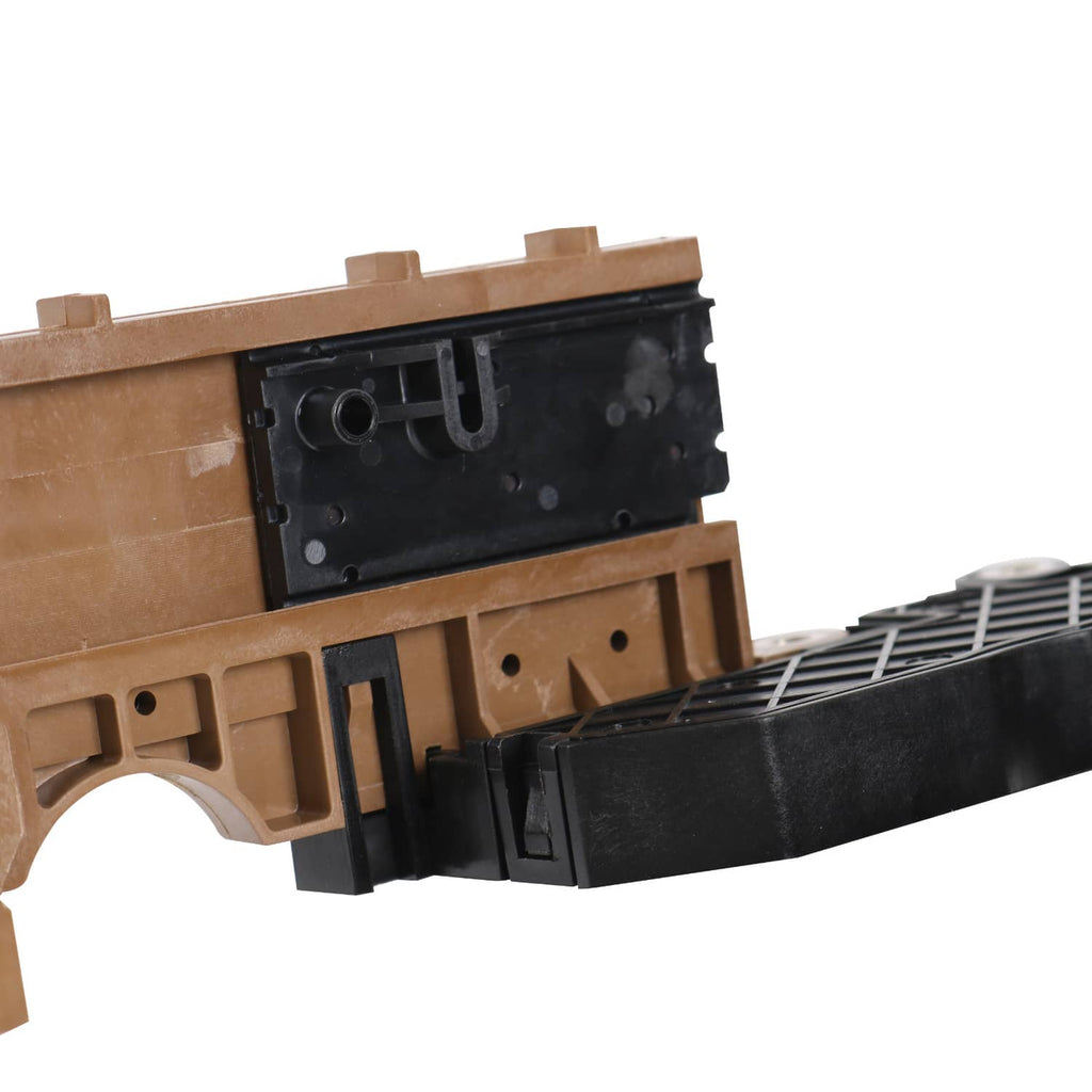 Transmission lead frame with beige housing and black base, showing mounting openings