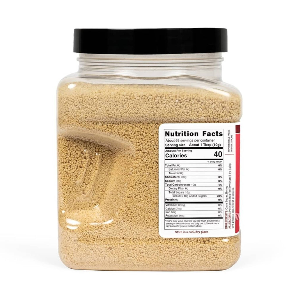 Granulated honey crystals jar showing Nutrition Facts panel and light tan crystals