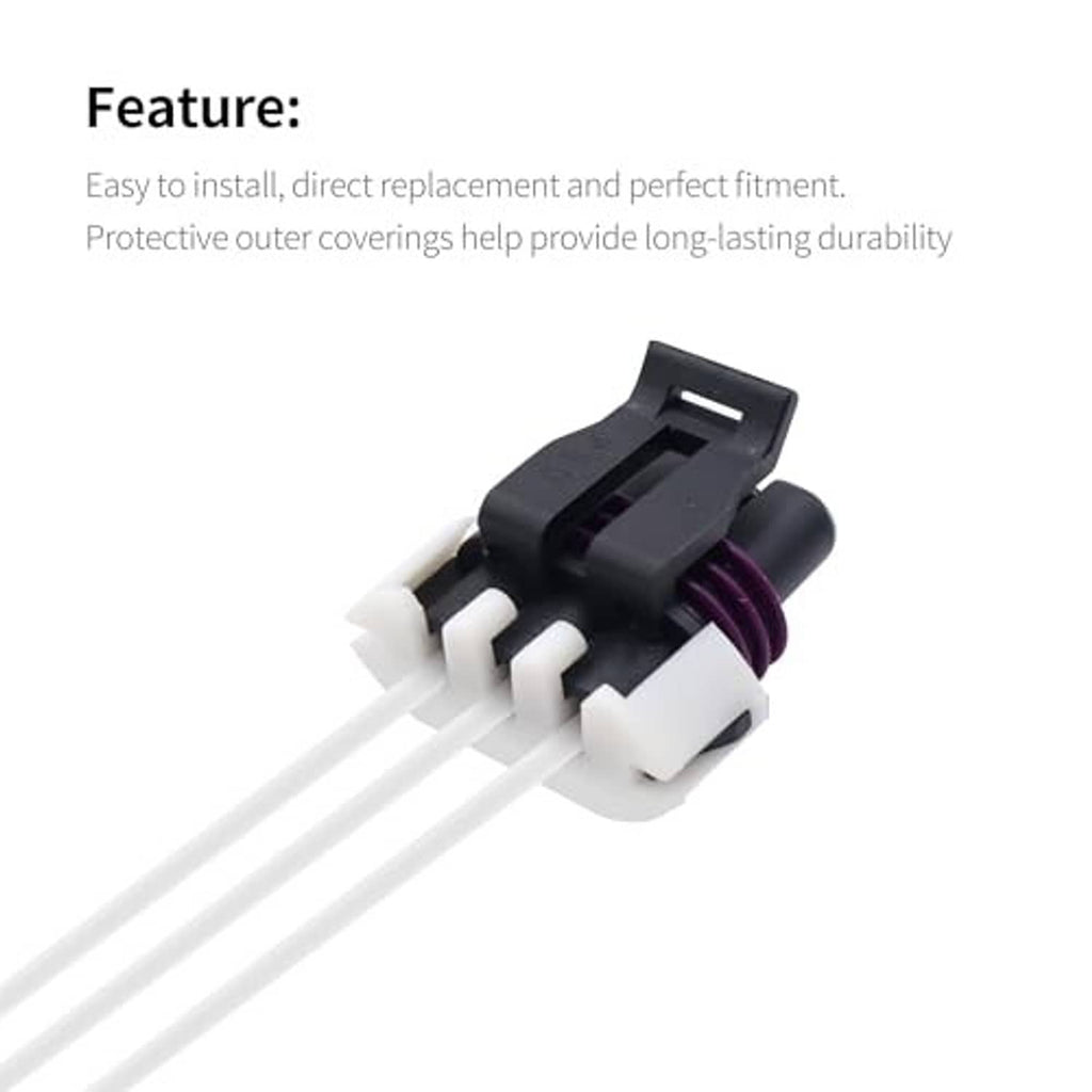 Crank sensor pigtail plug close-up with black latch housing, purple wire seal, metal pins