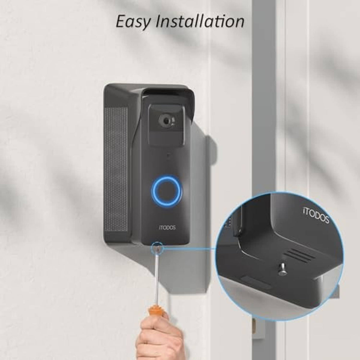 Black solar doorbell charger mounted on wall bracket, blue-ring LED