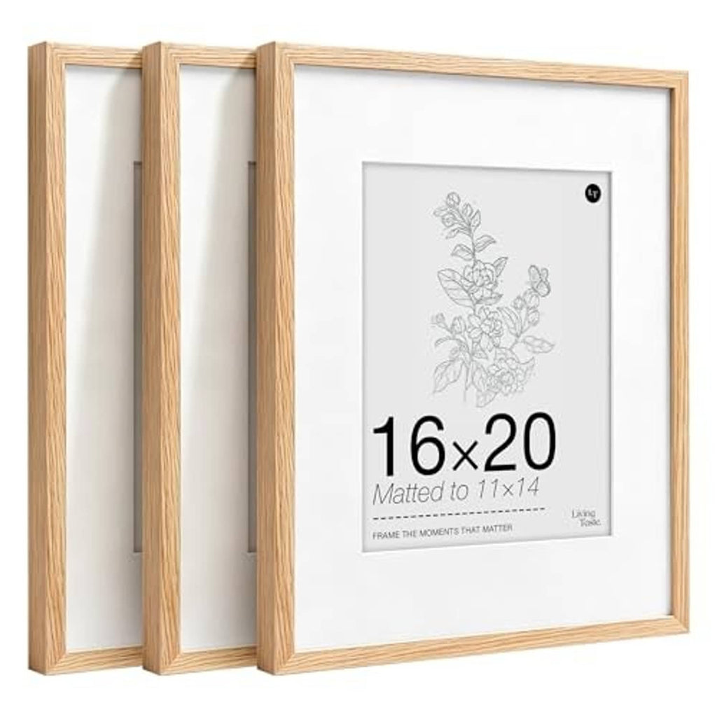 Set of three light oak wood picture frames with 16x20 display opening and white mat