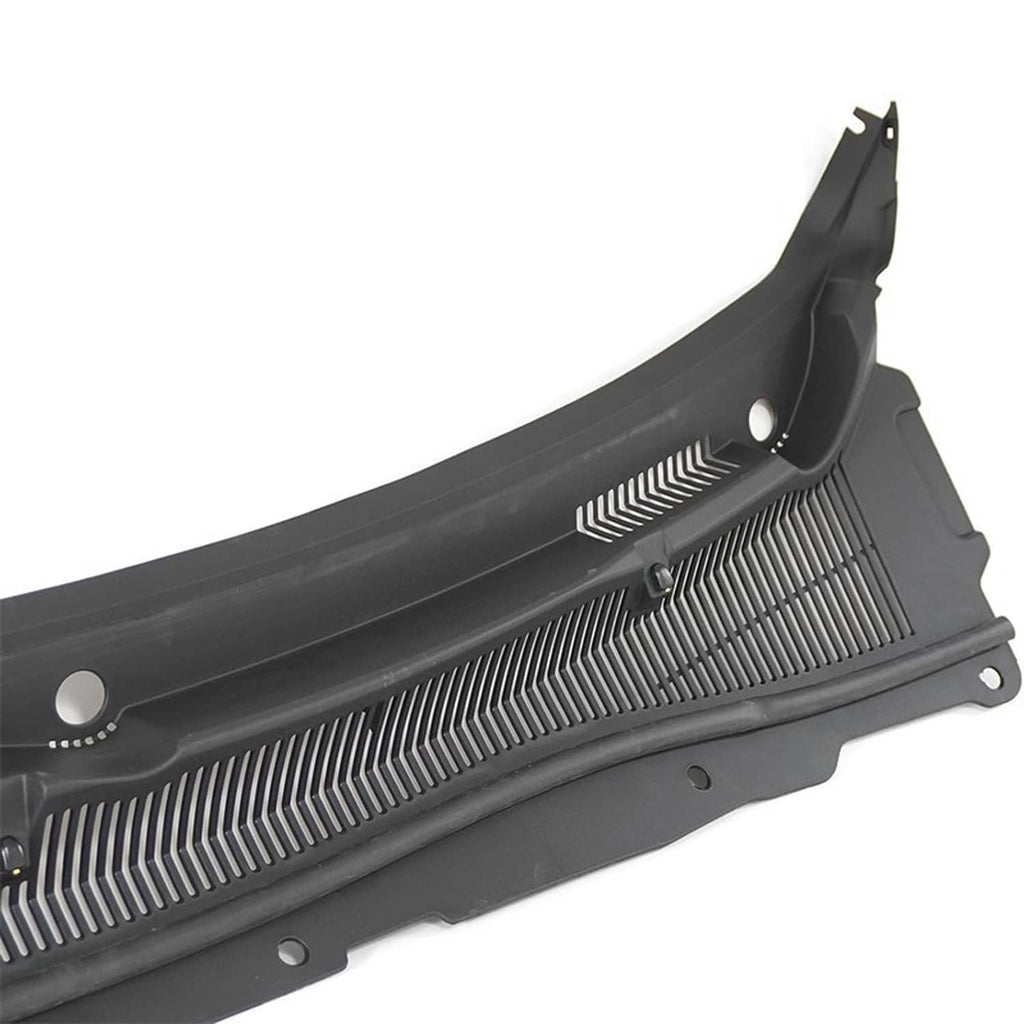 Close-up of black windshield wiper cowl cover vent grille with slatted fins and mounting holes