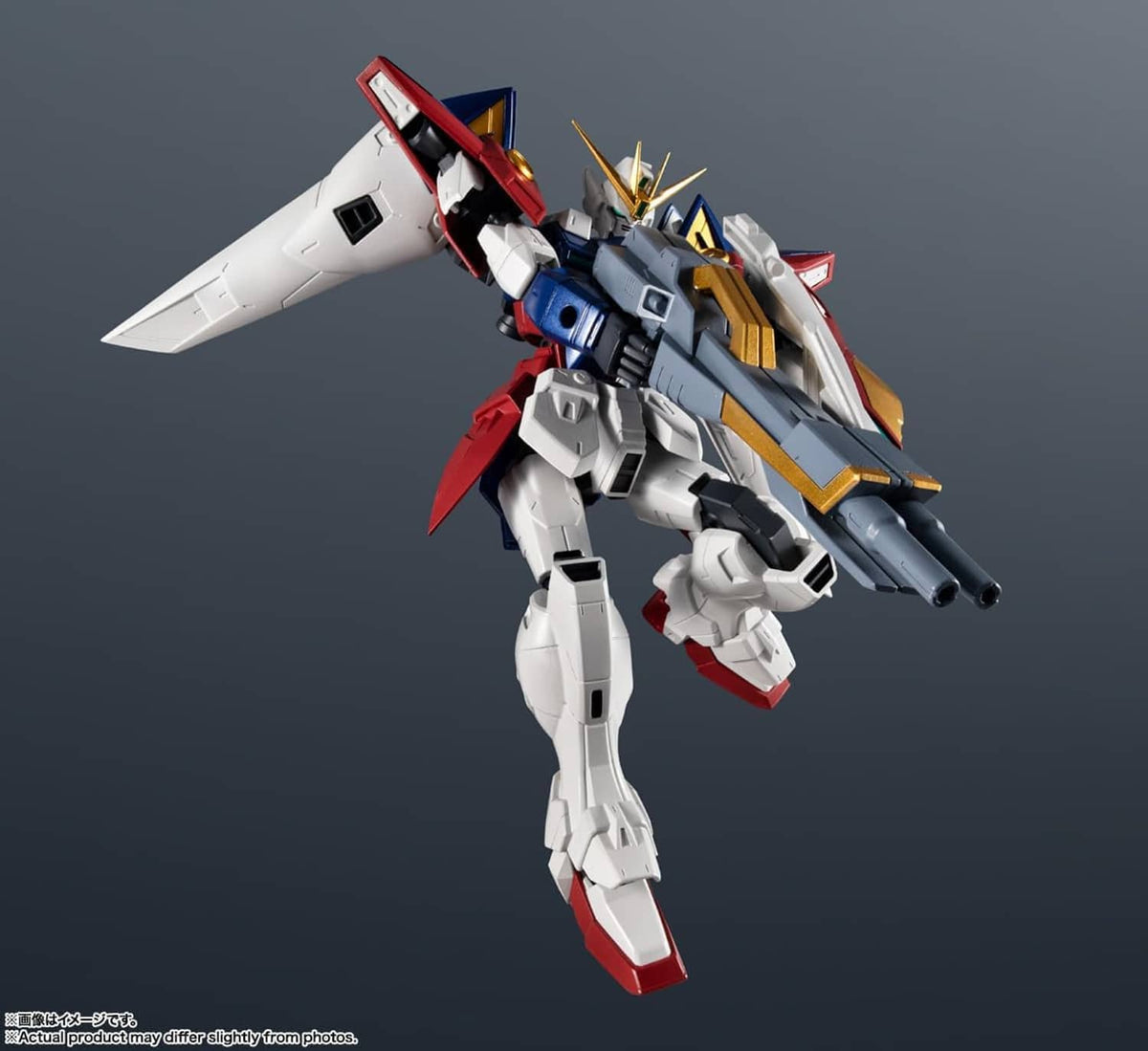 TAMASHII NATIONS Gundam action figure side view with rifle-like weapon and wing backpack