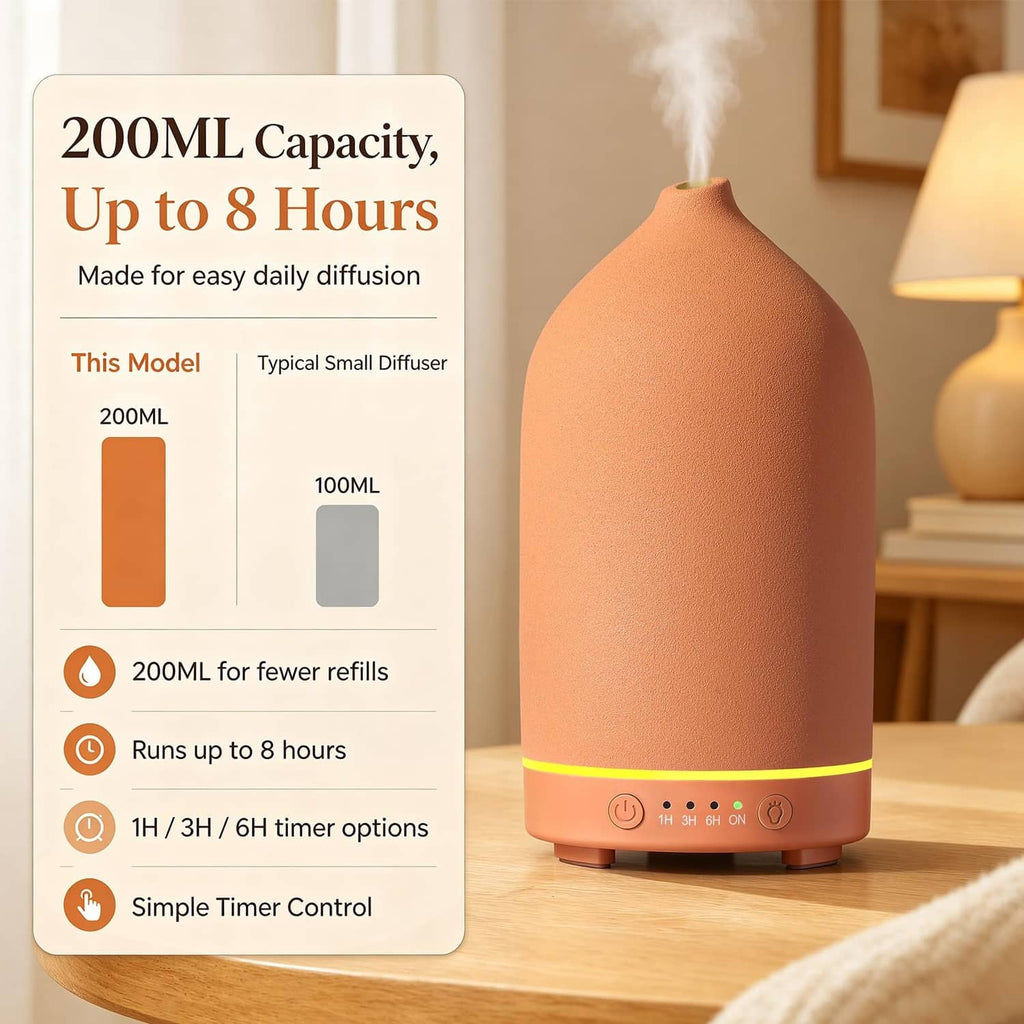 Gooamp ceramic essential oil diffuser, matte stone brown, mist rising from top nozzle