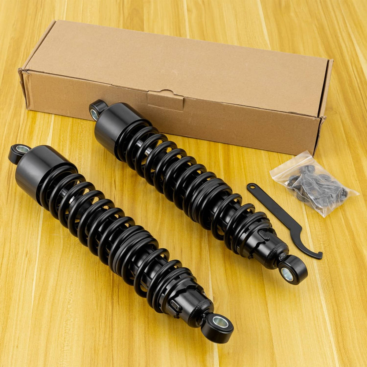 Adjustable rear shock absorbers, black pair with mounting hardware in box
