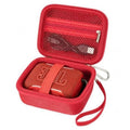 Red hard EVA speaker case open, showing molded holder and mesh-lined top pocket