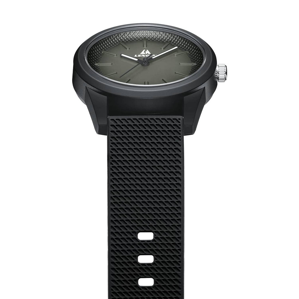 Black men's wristwatch with textured silicone strap and dark round dial, side crown.