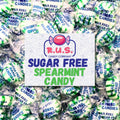 Individually wrapped sugar-free spearmint hard candies in green-and-white twist wrappers
