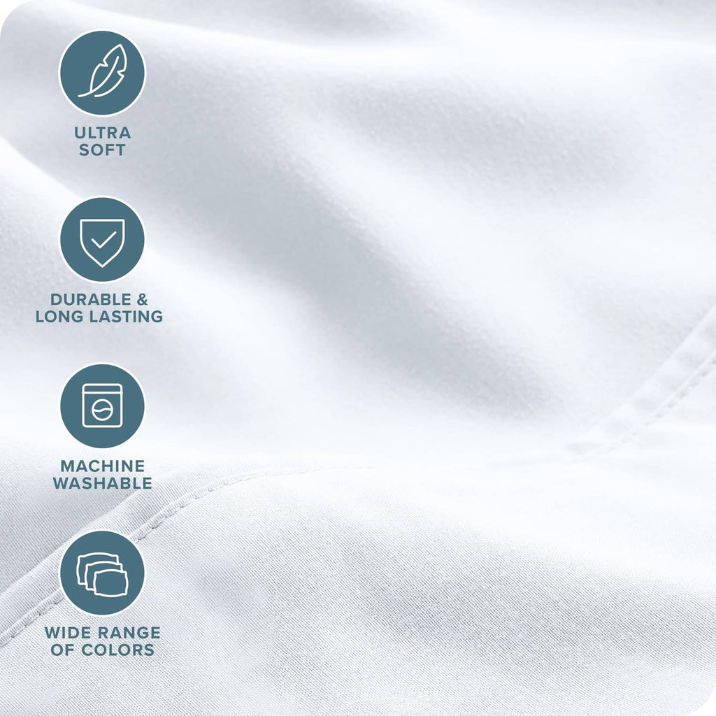 Close-up of white microfiber bedding fabric texture with smooth stitching