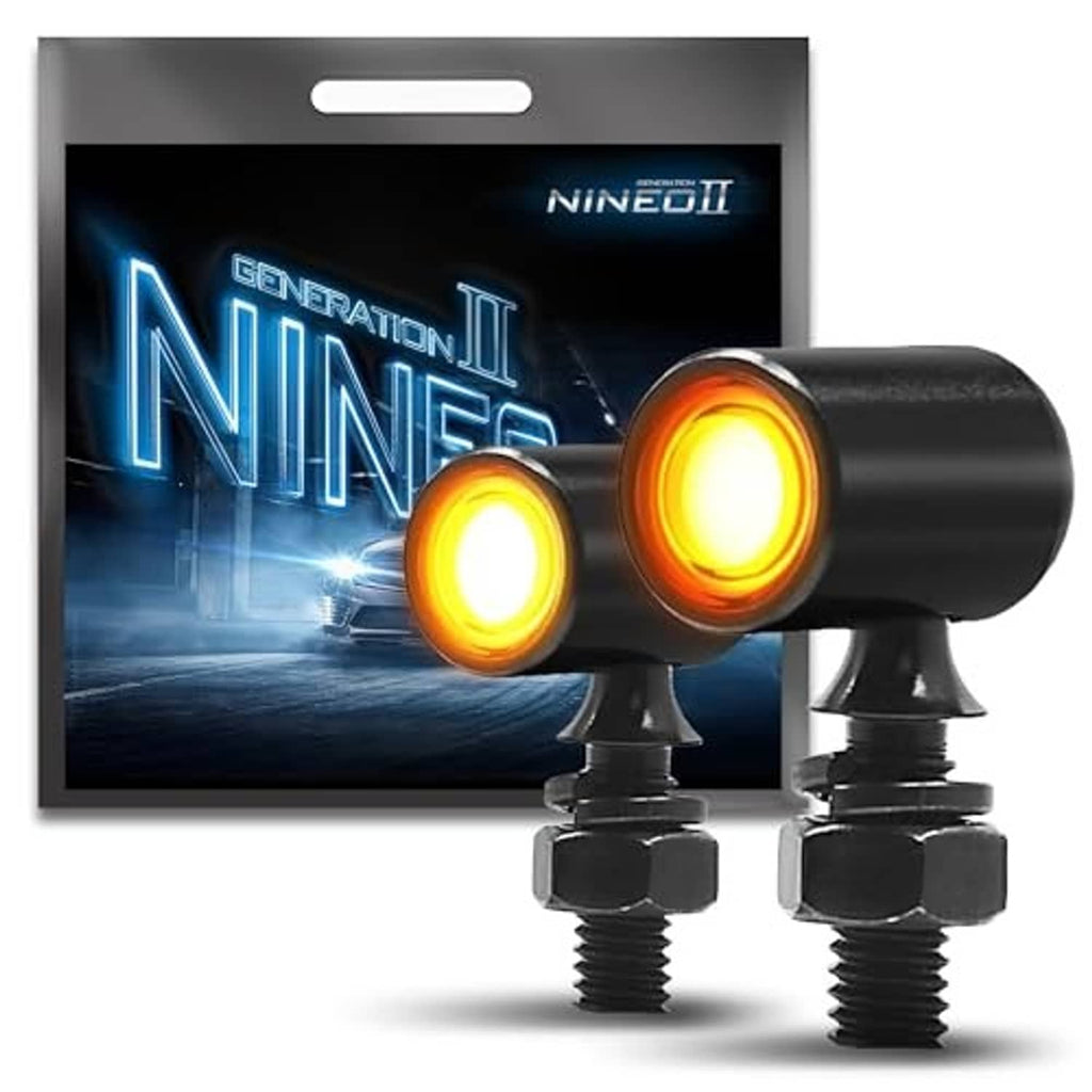 Black cylindrical mini LED motorcycle turn signals with amber lenses and two front mounting bolts.