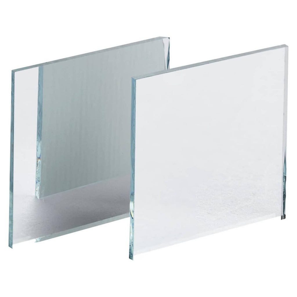 Two small square glass mirror tiles with reflective, blue-tinted glass surface