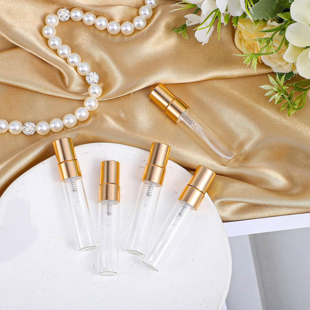 Set of clear 5ml glass atomizer spray bottles with gold caps, mini perfume vials