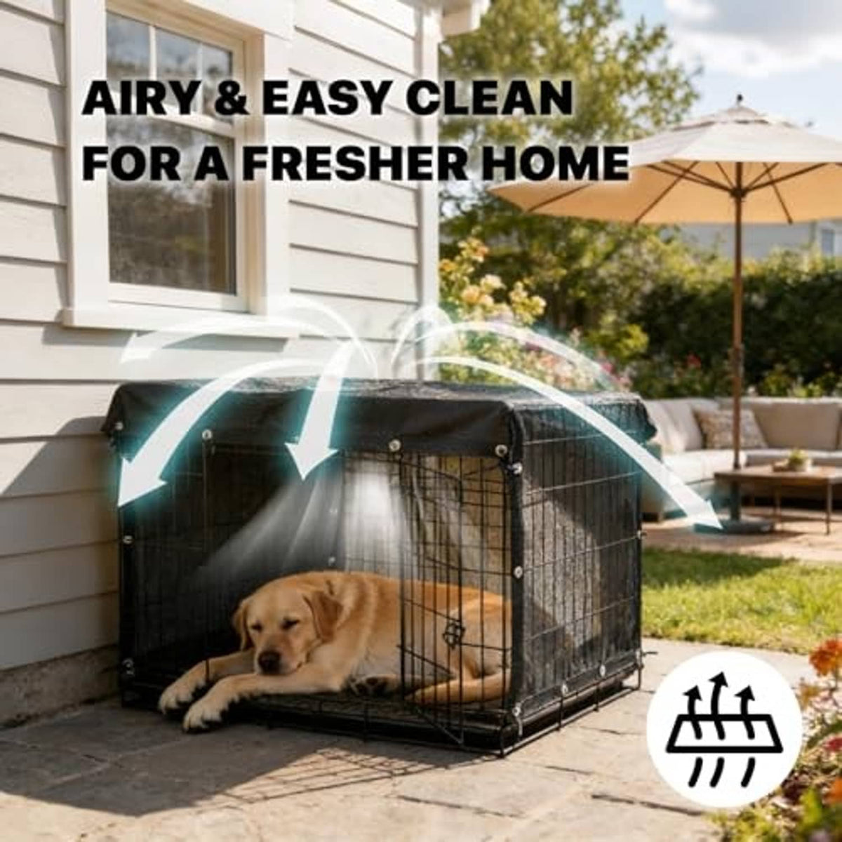 Black kennel shade cover on outdoor concrete patio with dog resting inside