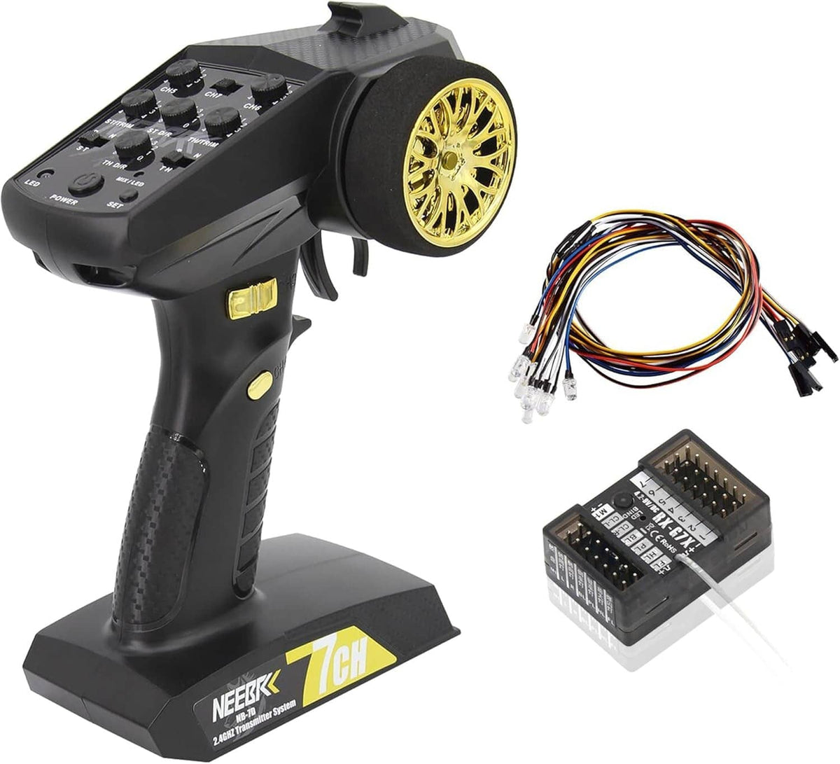 Black 7-channel RC transmitter with golden wheel and trigger controls on handle base