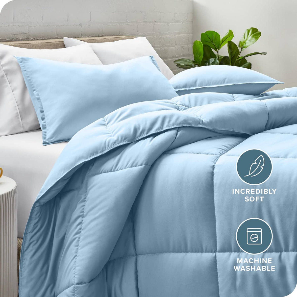 Light blue full comforter and pillow shams with stitched baffle quilting
