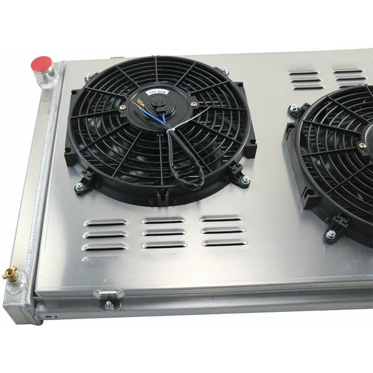 Radiator top with two black electric fans and vented airflow grille