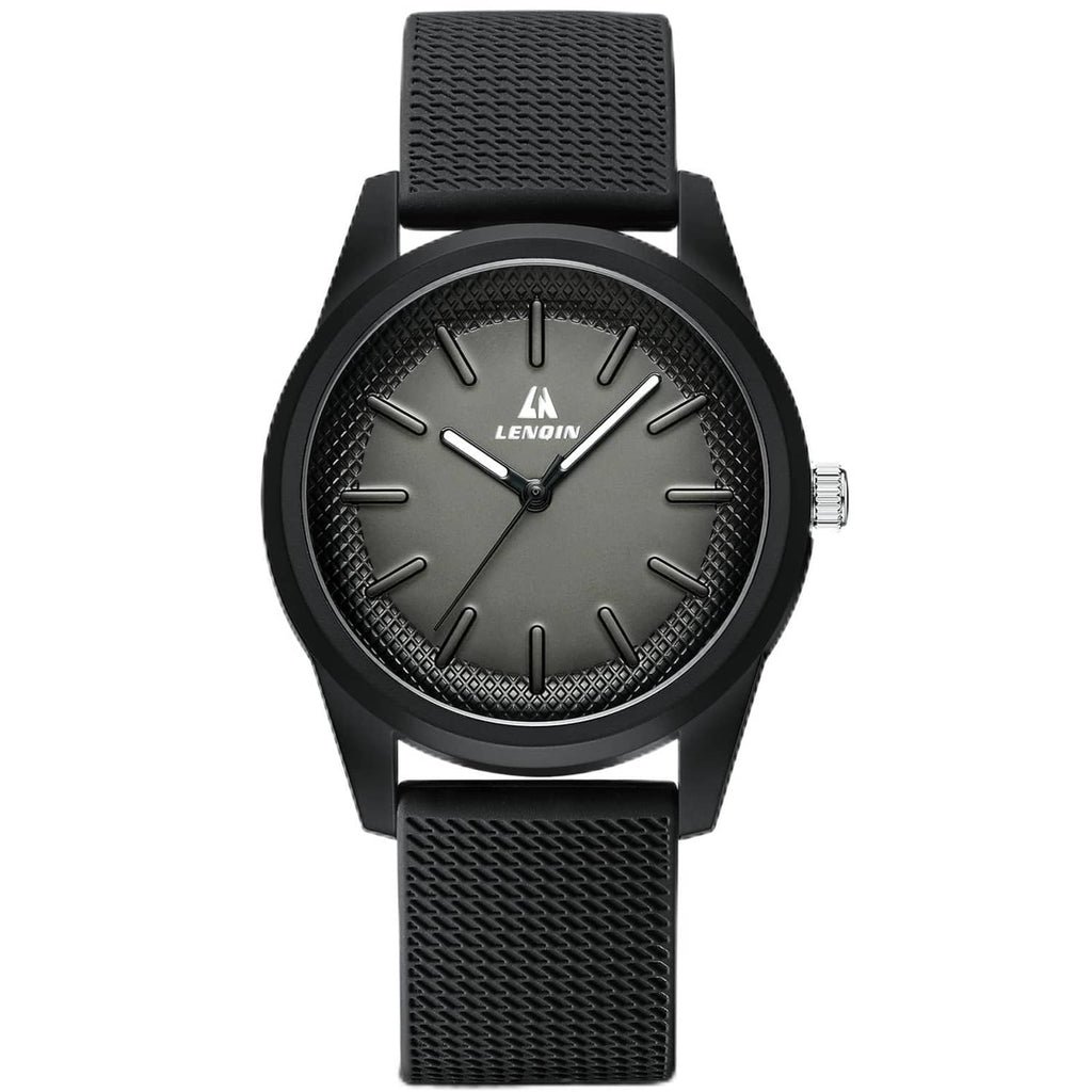 Black men's wristwatch with textured silicone strap and round dark dial, three hands.