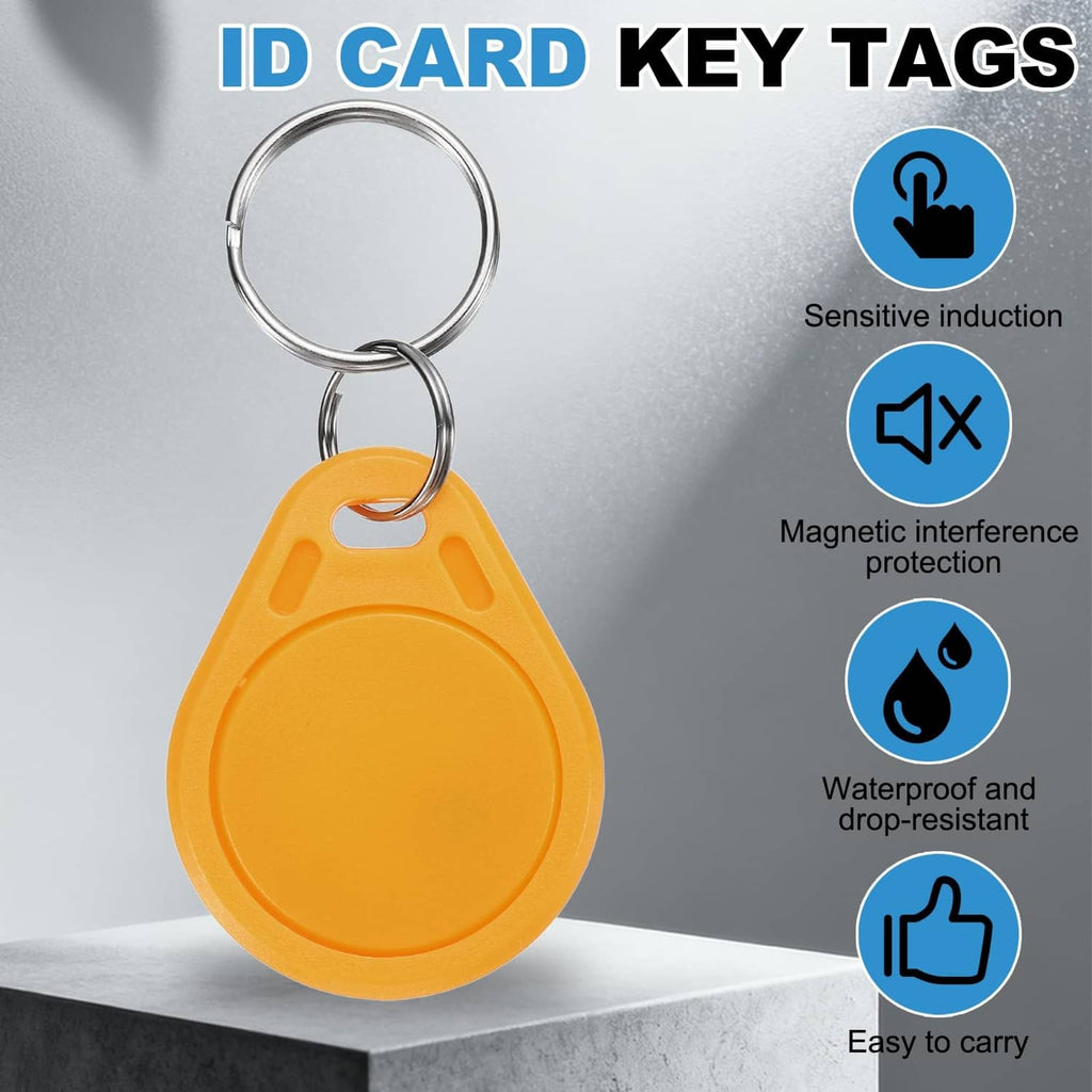 Yellow RFID ID key fob tag with metal key ring, close-up view
