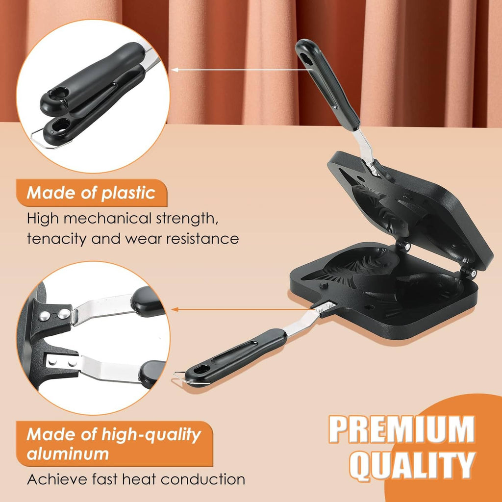 Black fish waffle maker with long handle and open lid showing fish imprint plates